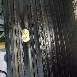 Valentino Black Handbag with Gold Accent logos tote clutch luxury designer